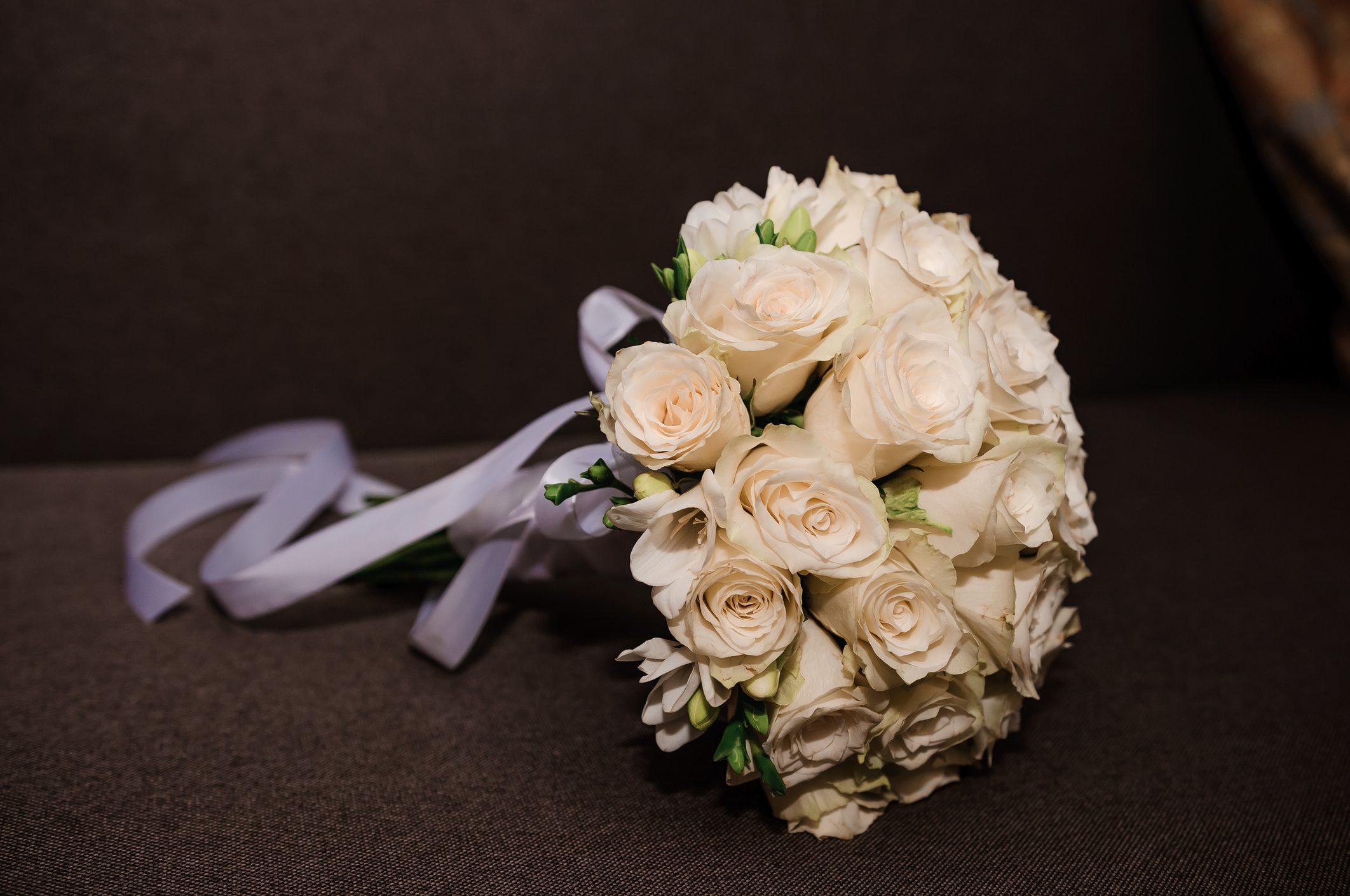 Elegant bridal bouquet on sofa