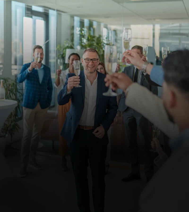 People cheering at a corporate event