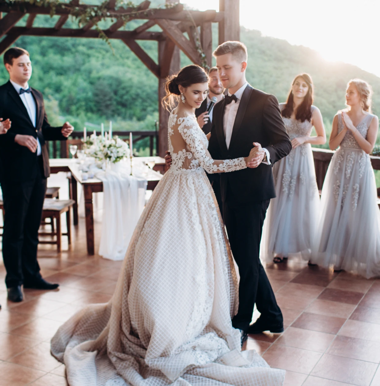 Elegant couple waltzing on outdoor terrace